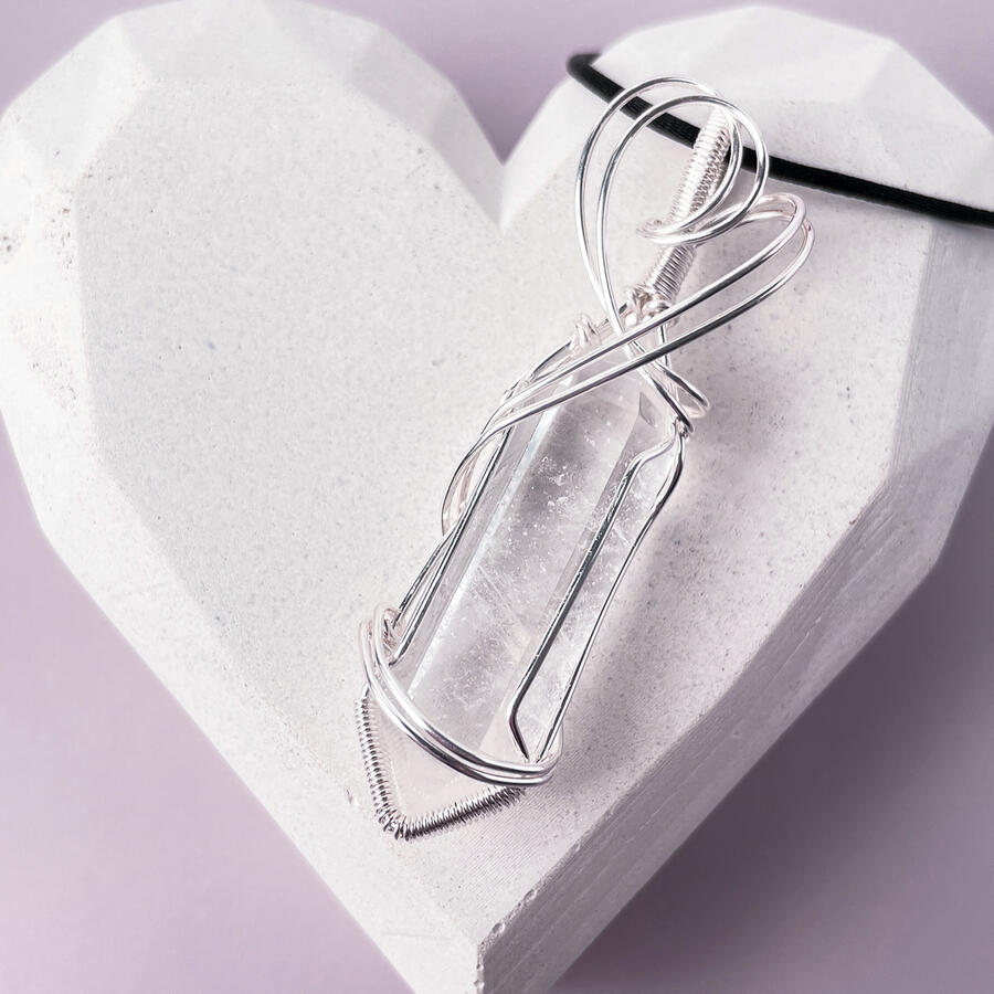 Stone & Spectra handmade Clear Quartz pendant in silver wire.