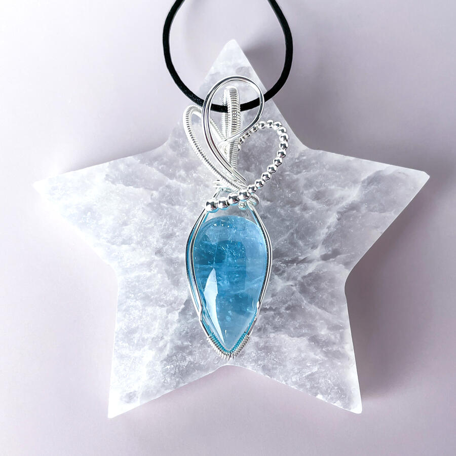Stone & Spectra handmade Aquamarine teardrop pendant in silver wire.